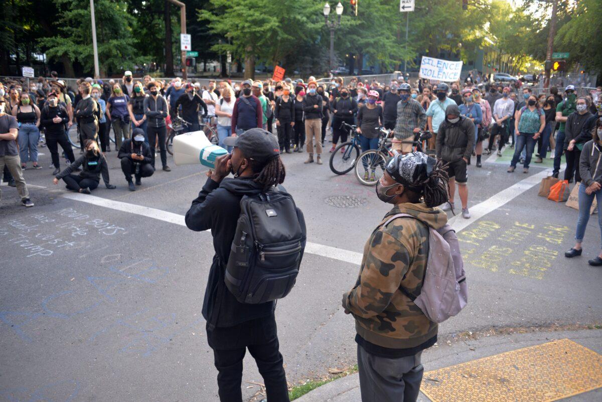 Demonstrators gather in front of the Multnomah County Justice Center in Portland, Ore., hours before rioting started, on July 17, 2020. (Ankur Dkholakia/AFP via Getty Images)