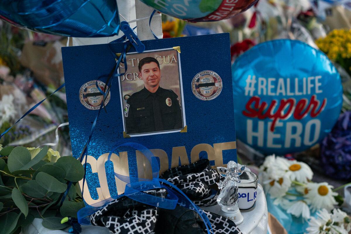 A photo of slain police officer Jonathan Shoop is shown at a memorial outside the Bothell Police Department in Bothell, Wash., on July 14, 2020. (David Ryder/Getty Images)