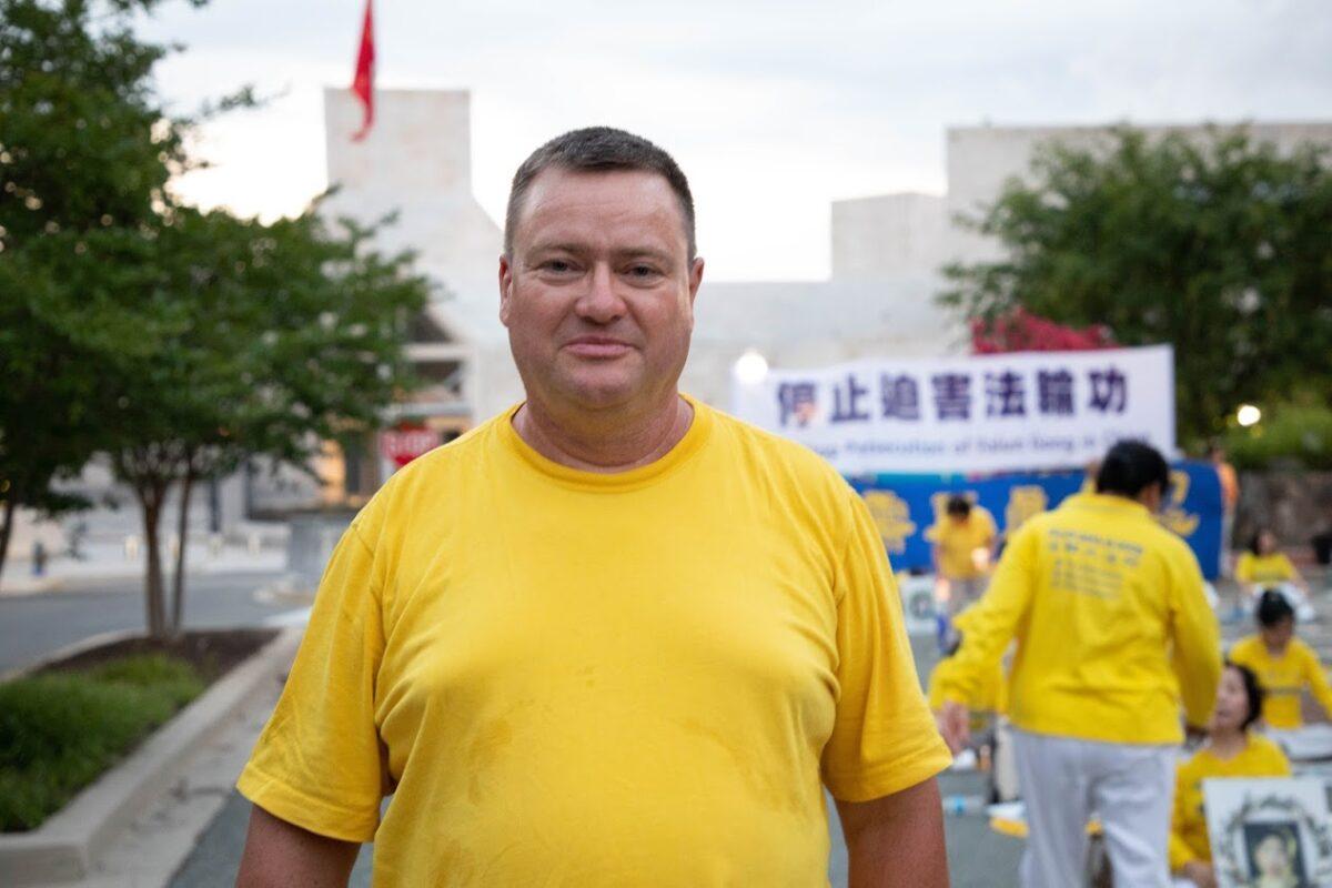 Bjorn Neumann outside the Chinese Embassy in Washington on July 17, 2020. (Lynn Lin/Epoch Times)
