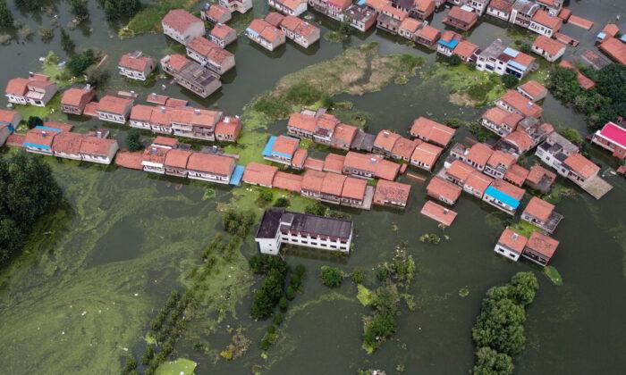 Dam Destroyed in Flood Emergency; 2nd Flood Wave arrives on Yangtze River; Xinjiang Virus Unrest