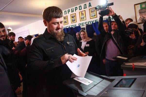 Chechnya's leader Ramzan Kadyrov casts his ballot as he votes during Russia's presidential election at a polling station in the settlement of Tsentoroy, outside Grozny, on March 18, 2018. (STR/AFP via Getty Images)