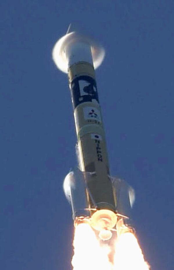 An H-2A rocket carrying the Hope Probe, developed by the Mohammed Bin Rashid Space Centre (MBRSC) in the United Arab Emirates (UAE) for the Mars explore, rises into the air after blasting off from the launching pad at Tanegashima Space Center on the southwestern island of Tanegashima, Japan, in this photo taken by Kyodo on July 20, 2020. (Kyodo/via Reuters)