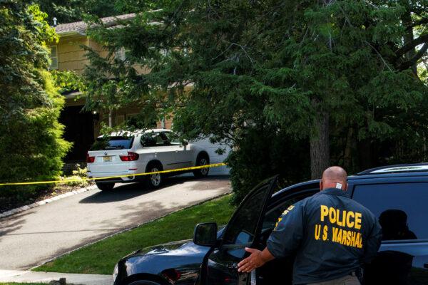 Law enforcement officials outside the home of federal judge Esther Salas in North Brunswick, N.J., on July 20, 2020. (Eduardo Munoz/Reuters)