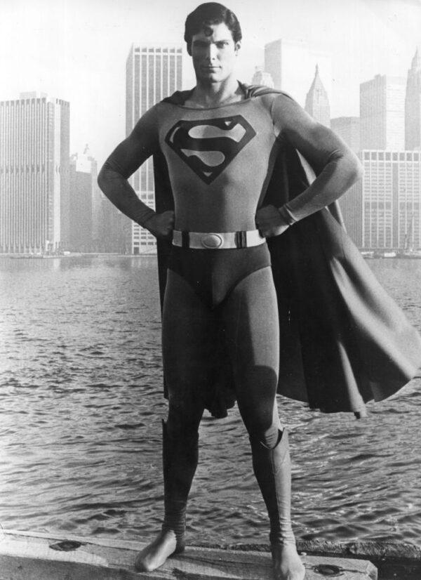 Twenty-four-year-old film actor Christopher Reeve stands before the Manhattan skyline dressed as the comic-book hero of the film "Superman." (Keystone/Getty Images)
