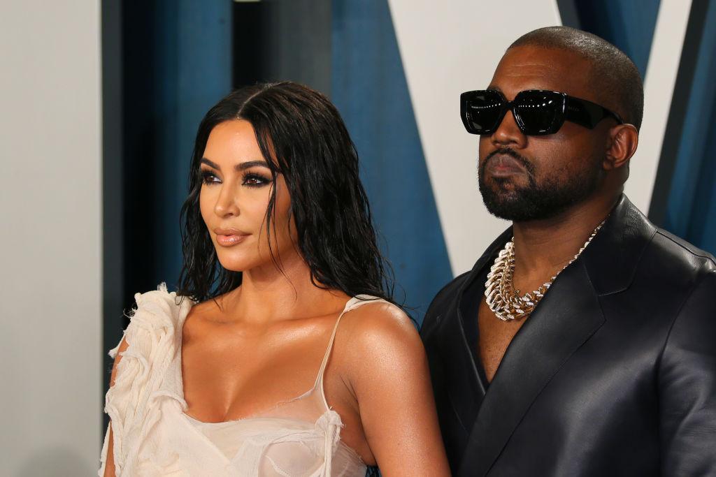 Kim and Kanye on the red carpet at the 2020 Vanity Fair Oscar Party on Feb. 9, 2020 (JEAN-BAPTISTE LACROIX/AFP via Getty Images)