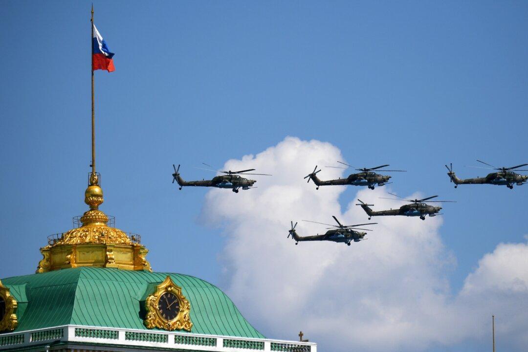 Russia, Hit by Coronavirus Crisis, Considers Military Spending Cuts