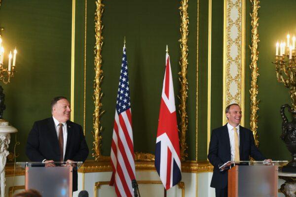 U.S. Secretary of State Mike Pompeo (L) and Britain's Foreign Secretary Dominic Raab take part in a joint press conference at Lancaster House, London, on July 21, 2020. (Peter Summers - WPA Pool/Getty Images)