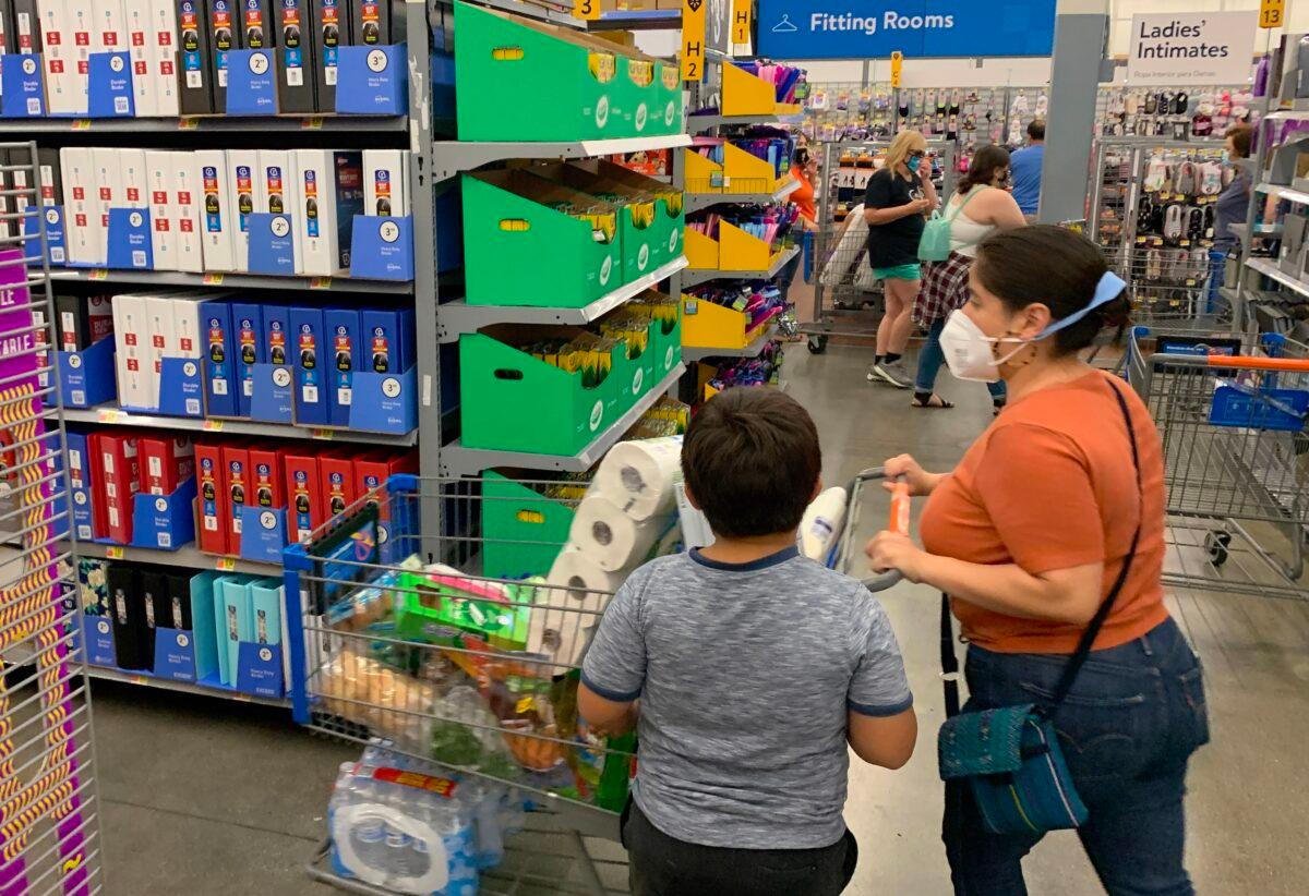Customers wear masks as they shop inside a Walmart in Burbank, Calif., on July 17, 2020. (Robyn Beck/AFP via Getty Images)