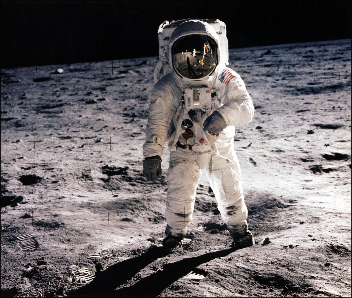 This picture taken 21 July 1969 shows astronaut Edwin E. Aldrin Jr. walking on the surface of the Moon near the leg of the Lunar Module "Eagle." (NASA/AFP via Getty Images)