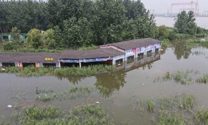 As China Suffers From Severe Flooding, Regime’s Leaders Disappear From Public