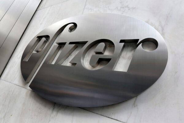 A Pfizer company logo is seen at the company's headquarters in New York. (Richard Drew/AP)