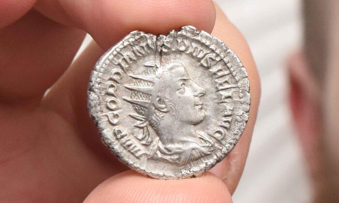 UK Man Stumbles on 1800-Year-Old Roman Silver Coin While Picking Litter in a Park