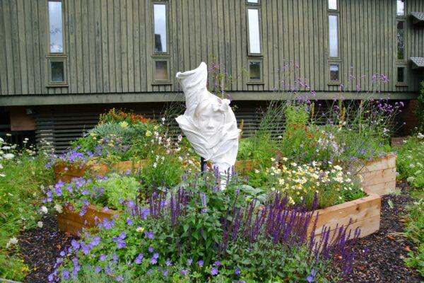 The Bee Garden at the Horniman Museum and Gardens with a new sculpture the Flower Girl (C) by Jasmine Pradissitto. (Horniman Museum and Gardens)