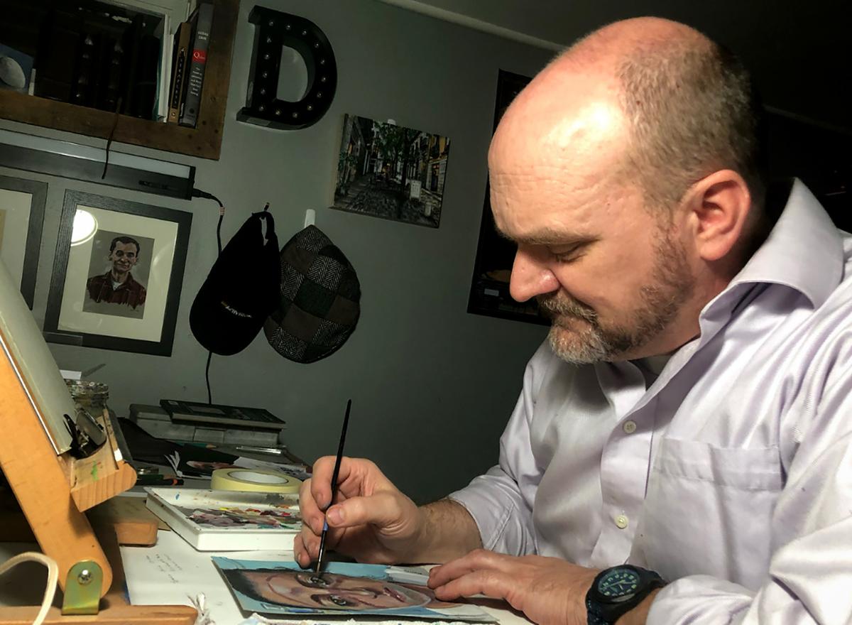 Artist Steve Derrick paints portraits of front line medics. (Courtesy of Steve Derrick)