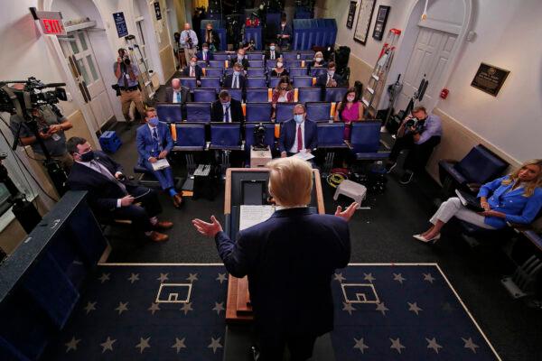 President Donald Trump talks to journalists during a news conference about his administration's response to the ongoing global CCP pandemic at the White House in Washington, on July 22, 2020. (Chip Somodevilla/Getty Images)