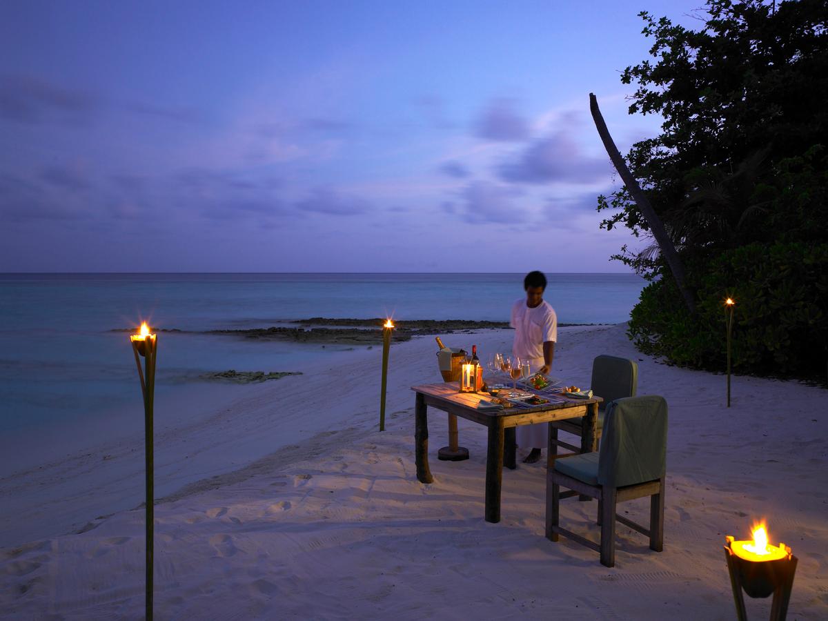 Dining on the beach at Soneva Fushi in the Maldives. (Courtesy of Soneva)