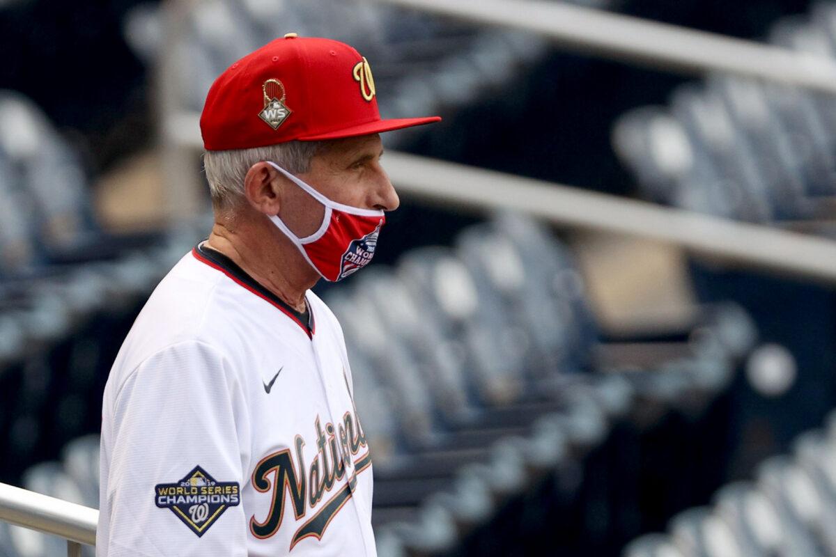 Anthony Fauci, director of the National Institute of Allergy and Infectious Diseases, looks on before throwing out the ceremonial first pitch on Opening Day of the Major League Baseball season, in Washington, on July 23, 2020. (Rob Carr/Getty Images)