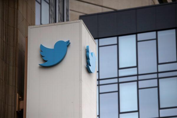 A sign is posted on the exterior of Twitter headquarters in San Francisco on July 26, 2018. (Justin Sullivan/Getty Images)