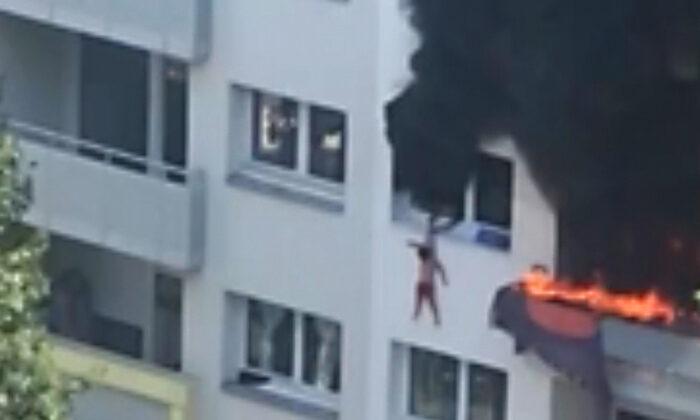 Crowd Catches Two French Children as They Jump From Burning Apartment in a ‘Heroic’ Rescue