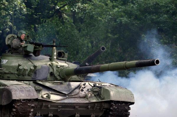 A Serbian army tank performs during exercise at a ceremony marking 72 years since the end of WWII and the defeat of Nazi Germany, at Nikinci training ground, 60 kilometers west of Belgrade, Serbia, on May 9, 2017. (Darko Vojinovic/AP Photo)