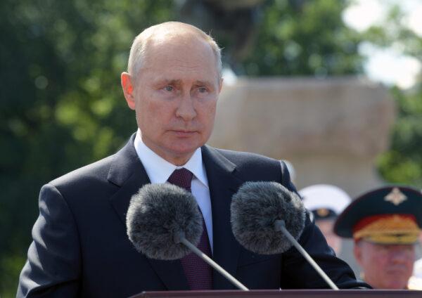 <br/>Russia's President Vladimir Putin delivers a speech during the Navy Day parade in Saint Petersburg, Russia, on July 26, 2020. (Sputnik/Alexei Druzhinin/Kremlin via Renters)
