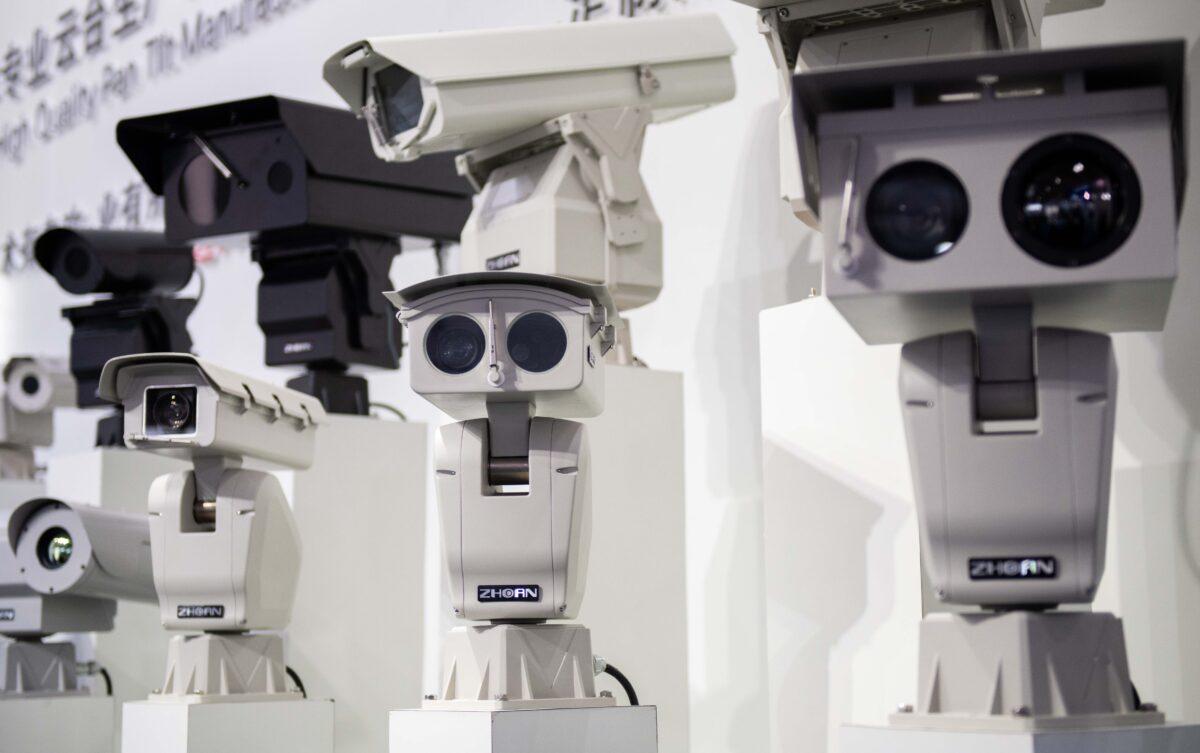 AI (artificial intelligence) security cameras using facial recognition technology are displayed at the 14th China International Exhibition on Public Safety and Security at the China International Exhibition Center in Beijing on Oct. 24, 2018. (Nicolas Asfouri/AFP) (Nicolas Asfouri/AFP via Getty Images)