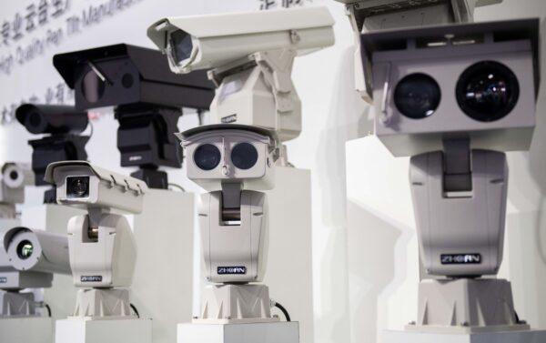 AI (artificial intelligence) security cameras using facial recognition technology are displayed at the 14th China International Exhibition on Public Safety and Security at the China International Exhibition Center in Beijing, China, on Oct. 24, 2018. (Nicolas Asfouri/AFP via Getty Images)