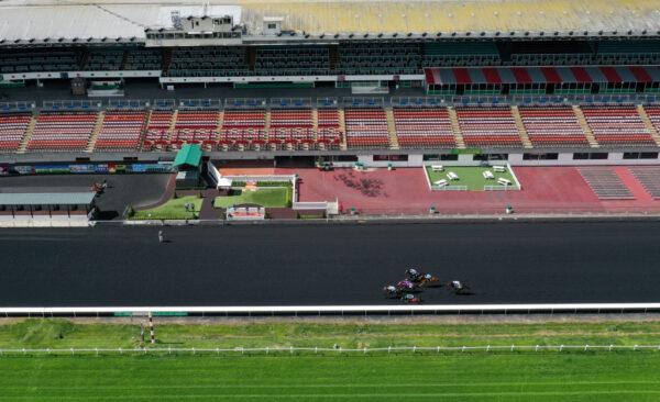 Horses race at Golden Gate Fields with no fans in attendance due to COVID-19 concerns in Berkeley, Calif., on March 19, 2020. (Justin Sullivan/Getty Images)