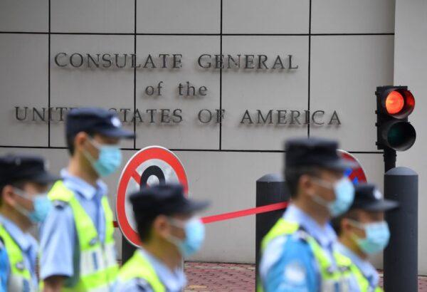 Policemen walk past the U.S. consulate in Chengdu, southwestern China's Sichuan Province, on July 26, 2020. (Noel Celis/AFP via Getty Images)