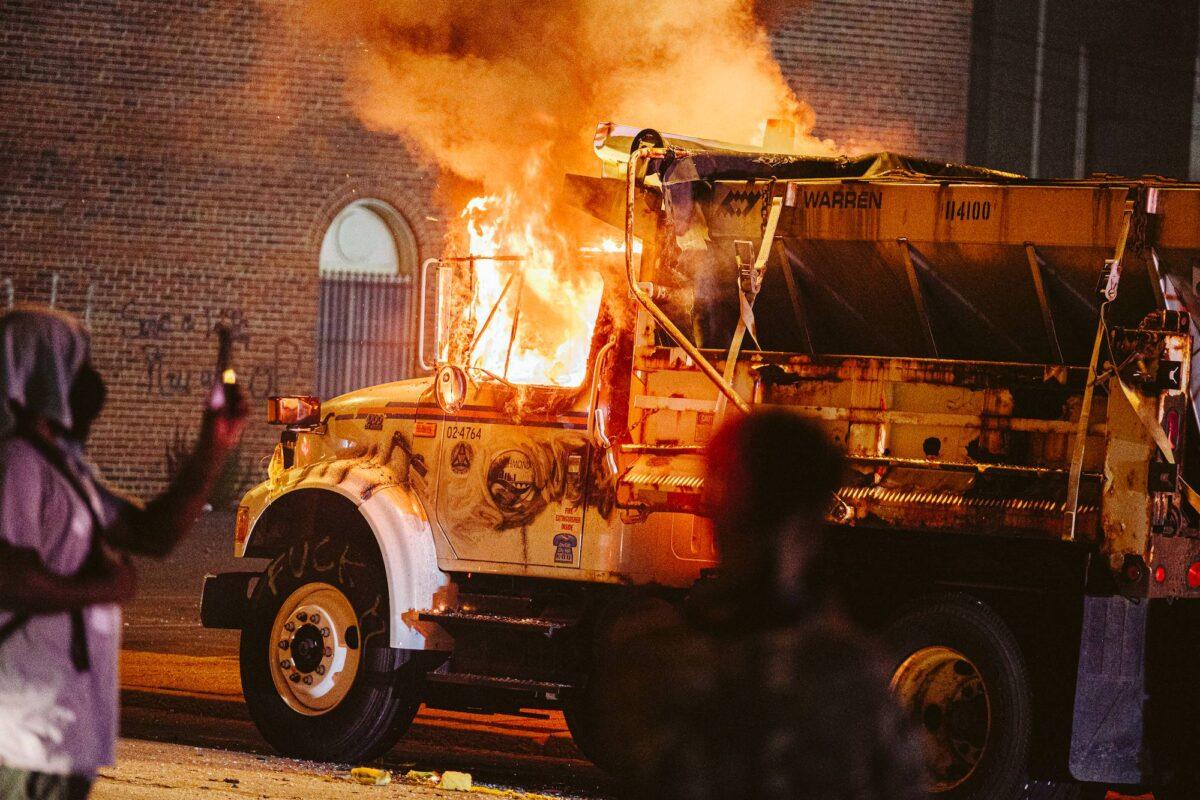 A parked truck is set on fire in Richmond, Virginia, on July 25, 2020. (Eze Amos/Getty Images)