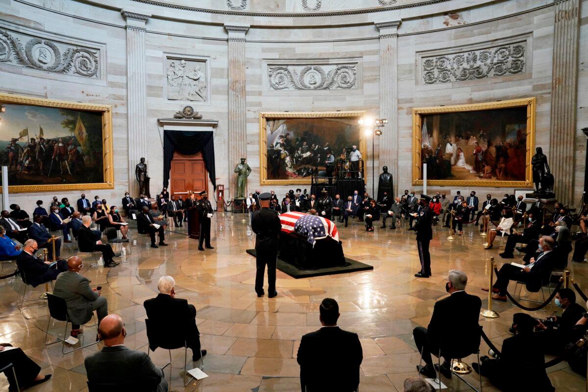 The flag-draped casket of the late Rep. John Lewis (D-Ga.) lies in state in the Rotunda of the U.S. Capitol in Washington on July 27, 2020. (J. Scott Applewhite/Pool/AFP via Getty Images)