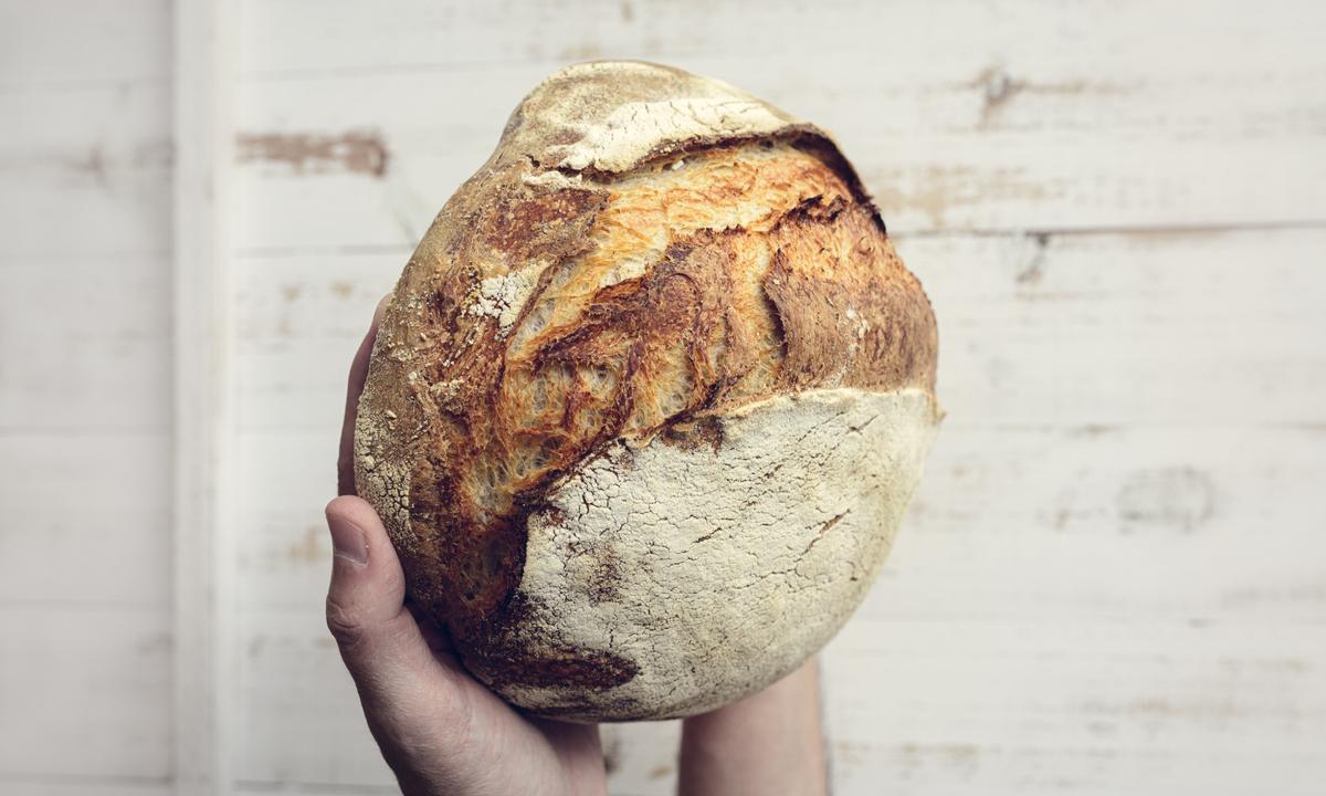 A freshly baked loaf of sourdough, from a starter nurtured in your own kitchen, is nourishment in more ways than one. (Mariana.Lebed/Shutterstock)