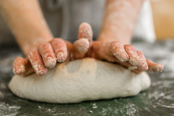 Sourdough is not a quick bread; it requires hours of resting and rising, then a few minutes of stretching and folding before another rise. (Arina P Habich/Shutterstock)