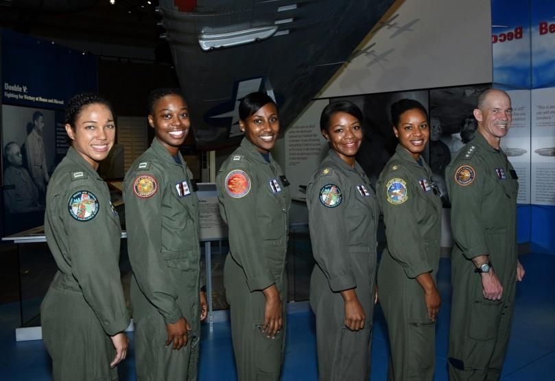 Adm. Charles Ray (far right) pictured with Lee and four of her colleagues on Feb. 21, 2019 (<a href="https://www.dvidshub.net/image/5160759/coast-guard-aviators-make-history">Petty Officer 1st Class Jetta Disco</a>/U.S. Coast Guard)