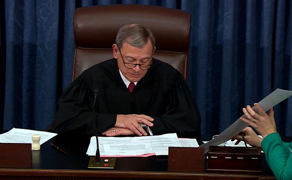 Chief Justice John Roberts announces the results of the vote on the second article of impeachment during impeachment proceedings against President Donald Trump in Washington on Feb. 5, 2020. (Senate Television via Getty Images)