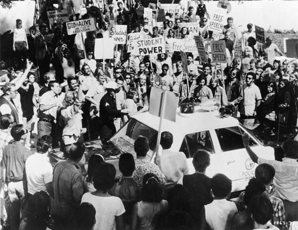 The unrest of the cultural revolution in America in the 1960s is the tide that informs today’s events. Anti-Vietnam protesters surround a police car outside the 1968 Democratic National Convention in Chicago. (Hulton Archive/Getty Images)