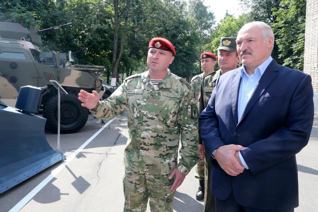 Belarus Detains Dozens of Russians as Election Tensions Rise