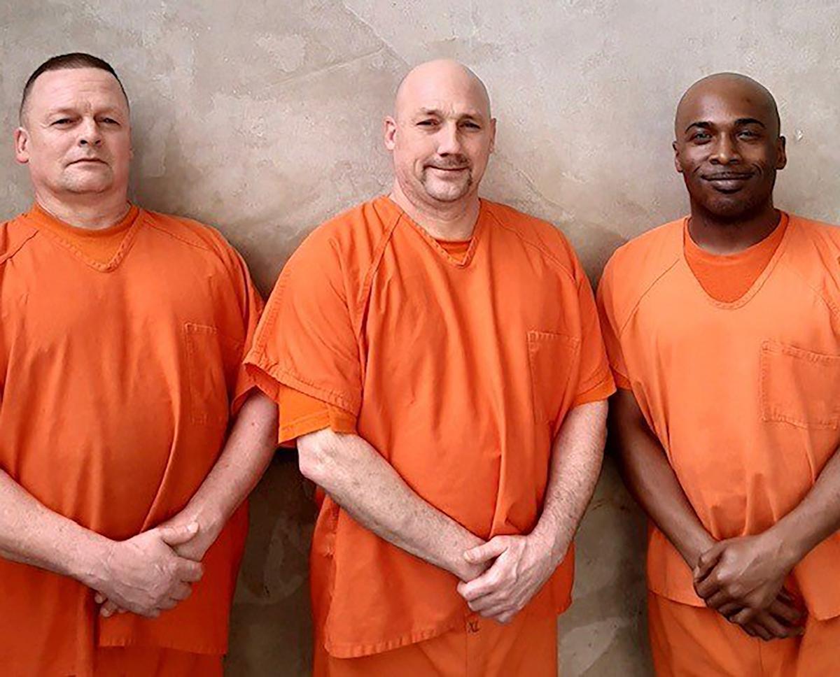 Three Gwinnett County inmates called out to a deputy who had fallen unconscious and then provided aid when he opened their cells, the Gwinnett County Sheriff's Office said. (Courtesy of Gwinnett Co. Sheriff's Office)