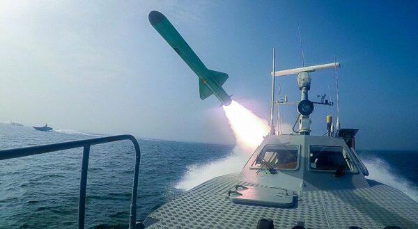 A Revolutionary Guard's speed boat fires a missile during a military exercise on July 28, 2020. (Sepahnews via AP)