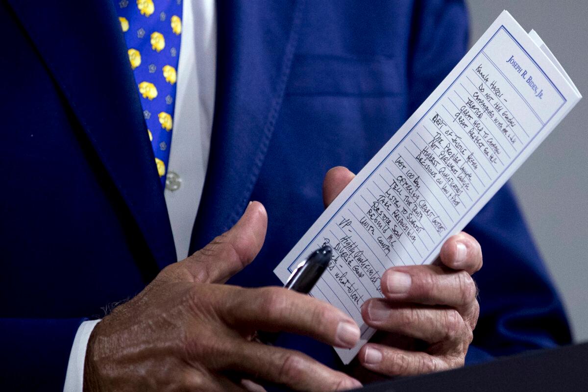 The notes of Democratic presidential candidate former Vice President Joe Biden reference Sen. Kamala Harris (D-Calif.), among other things, as he speaks at a campaign event at the William "Hicks" Anderson Community Center in Wilmington, Del., on July 28, 2020. (Andrew Harnik/AP Photo)