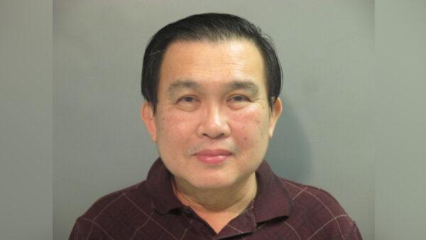 Simon Saw-Teong Ang, a former professor at the University of Arkansas, pleads guilty on Jan. 21, 2022, to lying to the FBI about his numerous patents filed in China. (Washington County Detention Center)