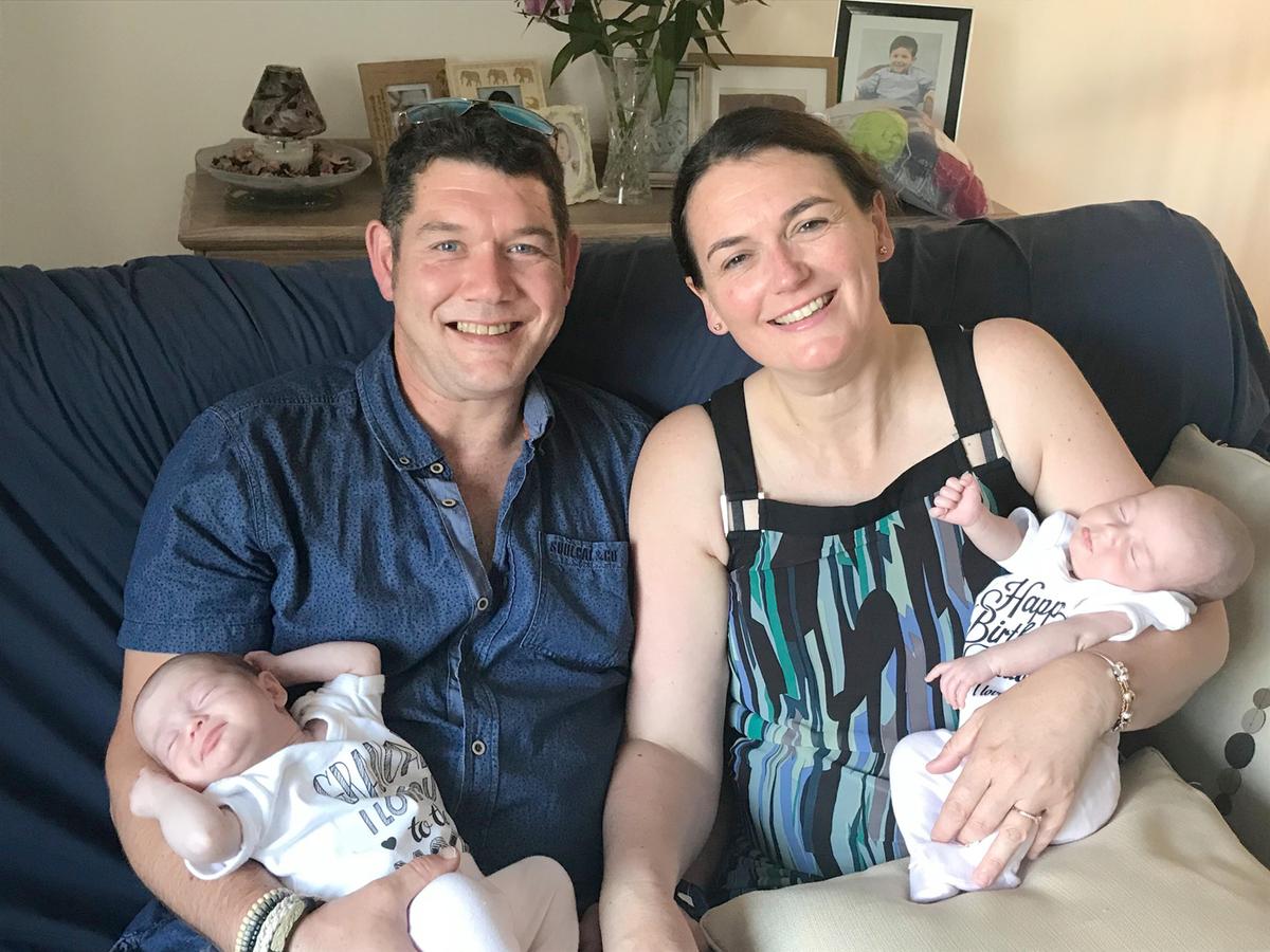 Rebecca Allen and her partner, Andrew Kirkwood, with the twins Luna (R) and Seren Kirkwood (L) on their dad's birthday in August 2019 (Caters News)
