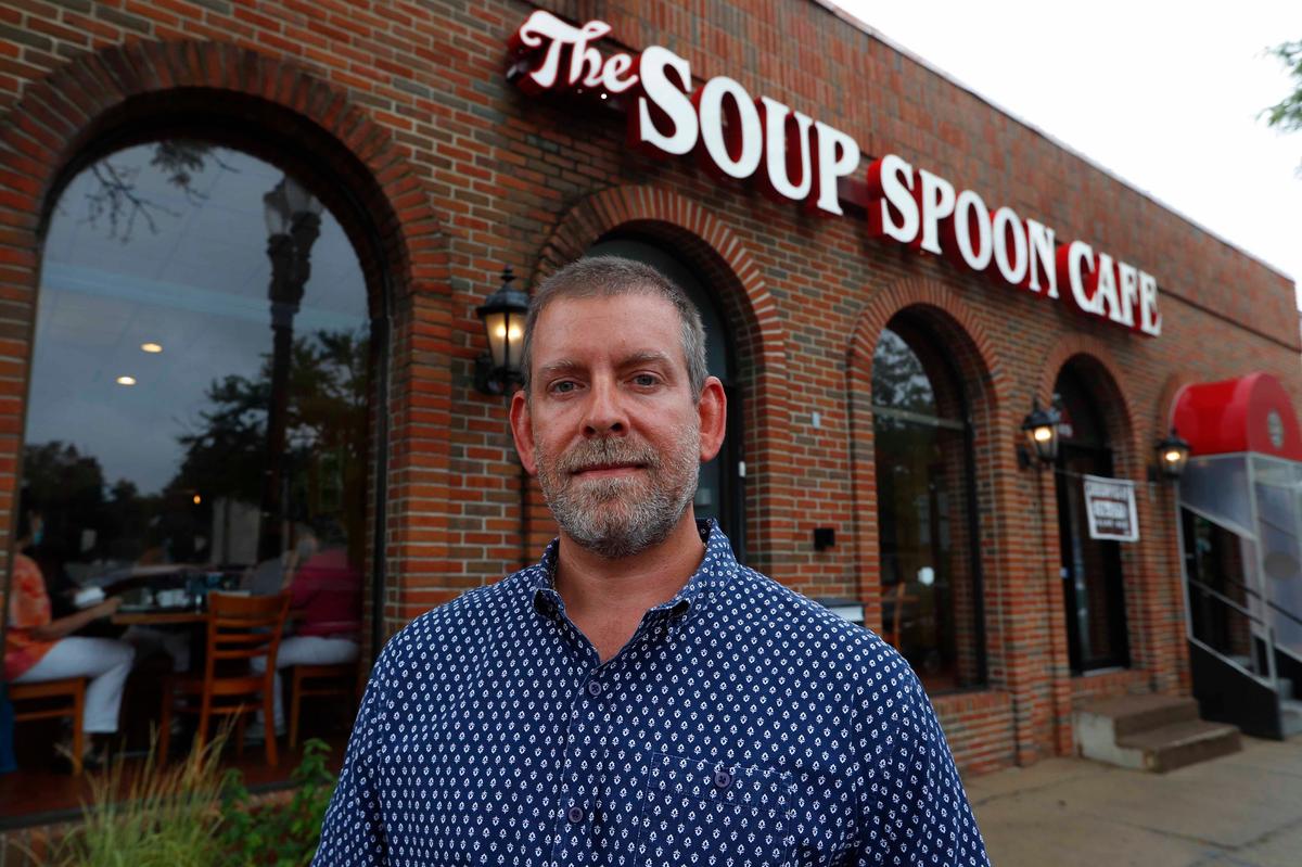 Nick Gavrilides, the owner of the Soup Spoon, poses outside of one of his two restaurants in Lansing, Mich., Thursday, July 16, 2020. (Paul Sancya/AP Photo)