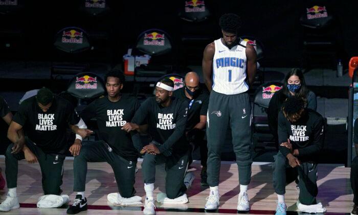 NBA Player, Coaches Stand During National Anthem