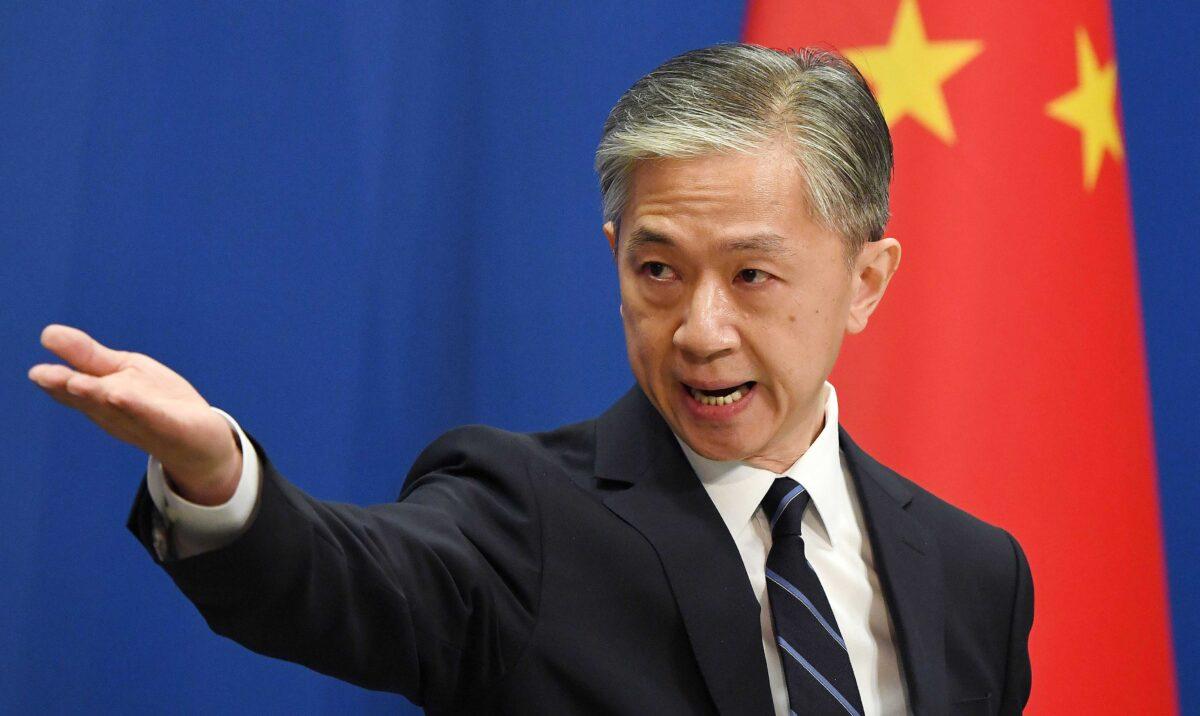Chinese Foreign Ministry spokesman Wang Wenbin takes a question during a daily Foreign Ministry briefing in Beijing on July 24, 2020. (Greg Baker/AFP via Getty Images)