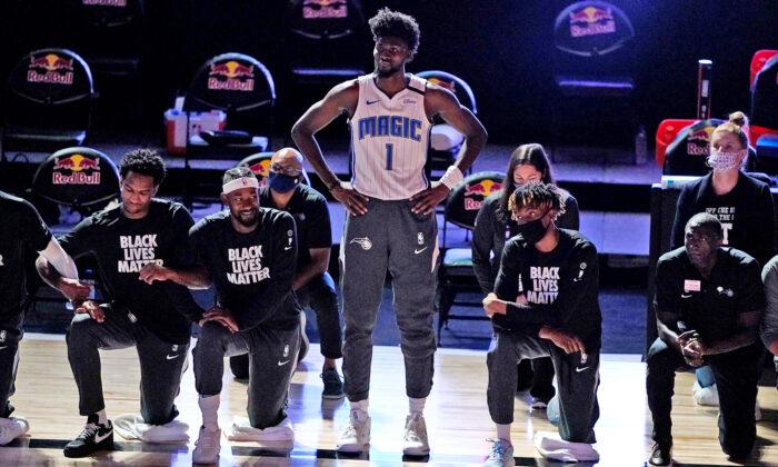 NBA’s Jonathan Isaac Chooses to Stand for Anthem While Teammates Take a Knee