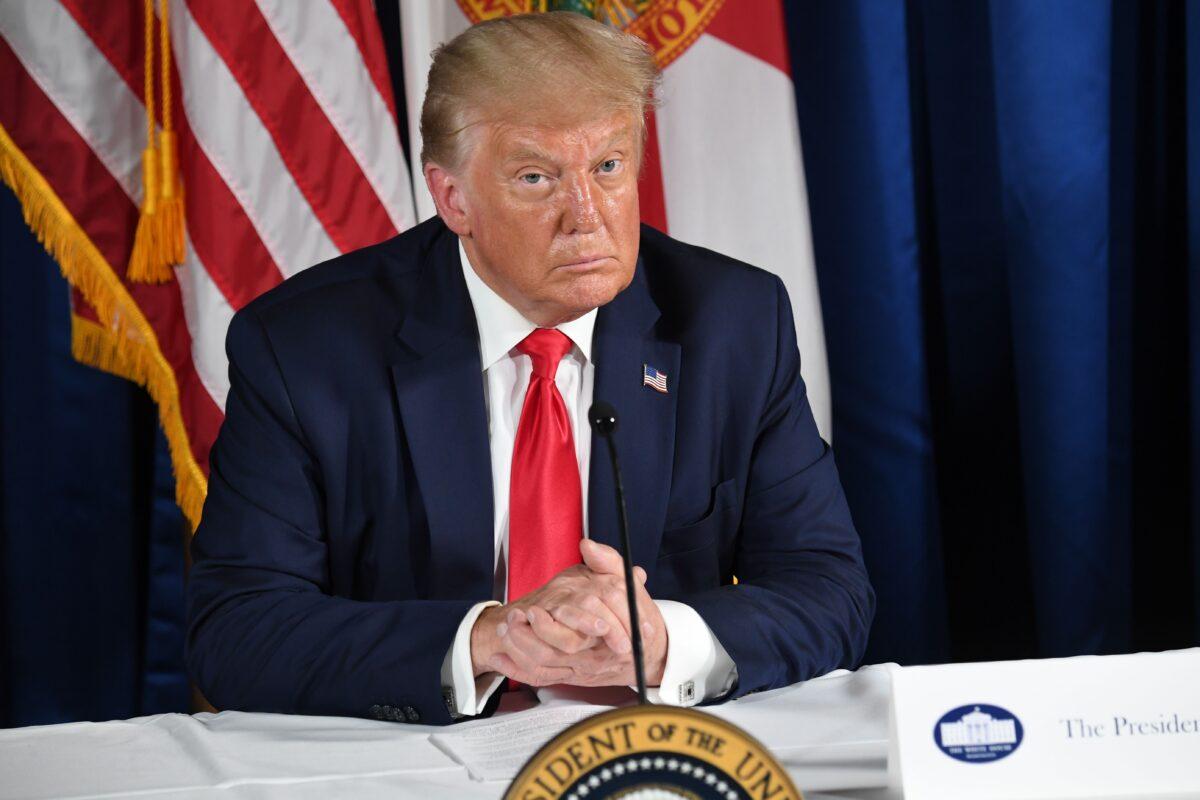 President Donald Trump holds a COVID-19 and storm preparedness roundtable in Belleair, Fla., on July 31, 2020. (Saul Loeb/AFP via Getty Images)