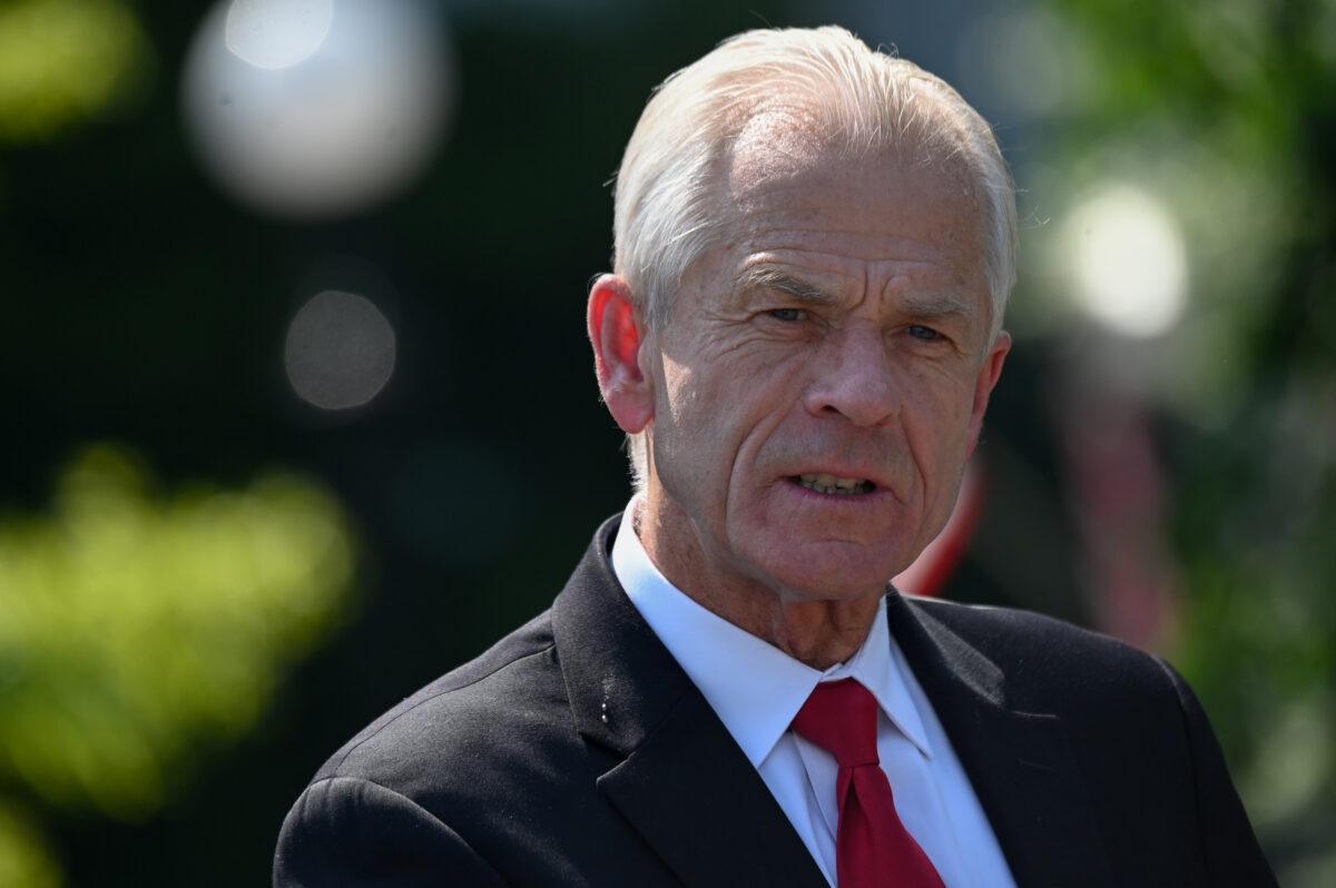 White House adviser Peter Navarro speaks to reporters outside the West Wing in Washington on July 3, 2020. (Erin Scott/Reuters)