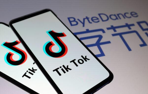 Tik Tok logos are seen on smartphones in front of a displayed ByteDance logo in this illustration taken Nov. 27, 2019. (Dado Ruvic/Illustration/File Photo/Reuters)