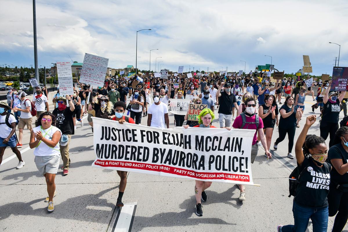 People protest over the death of Elijah McClain, in Aurora, Colo., on June 27, 2020. (Michael Ciaglo/Getty Images)
